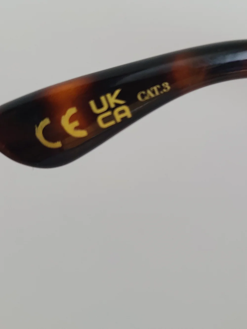 Mango Tortoiseshell Sunglasses with Dark Brow Amber Accents and Navy Blue Lenses